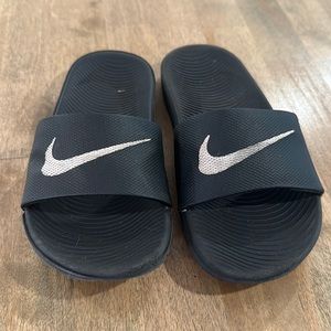 Black Nike slides